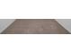 Neutral carpeting stretches wall-to-wall with clean white baseboards at 744 Osprey Roost Dr, Lakeland, FL 33801
