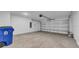 Spacious two-car garage with concrete flooring and automatic door opener at 744 Osprey Roost Dr, Lakeland, FL 33801