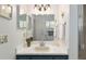 Bright bathroom featuring modern vanity, decor, and fixtures, complementing the clean and updated design at 11540 Sw 84Th Avenue Rd, Ocala, FL 34481