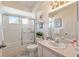 Well-lit bathroom featuring a tub with shower, updated fixtures, and a clean, inviting design at 11540 Sw 84Th Avenue Rd, Ocala, FL 34481