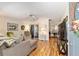 Spacious living room features wood flooring and an open layout at 11540 Sw 84Th Avenue Rd, Ocala, FL 34481