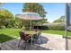 Outdoor patio with dining table and chairs, perfect for enjoying the backyard at 11540 Sw 84Th Avenue Rd, Ocala, FL 34481