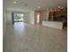 Bright and airy kitchen with granite countertops, stainless steel appliances and center island at 4910 Lyric Dr, Mascotte, FL 34753