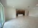 Open-concept living room connected to kitchen at 4910 Lyric Dr, Mascotte, FL 34753