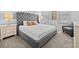 Bedroom with neutral decor, carpet, comfortable furnishings, and lots of natural light at 9001 Flamingo Key Way, Kissimmee, FL 34747