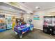Enjoy the arcade with a variety of games, including claw machines, and an air hockey table at 2710 Manesty Ln, Kissimmee, FL 34747