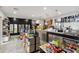 Aisles of goods and deli counter in a brightly lit market, with beverages, snacks, and fresh food options at 2710 Manesty Ln, Kissimmee, FL 34747