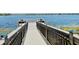 Community dock offers picturesque lake views and access for boating and water activities at 7443 Lake Albert Dr, Windermere, FL 34786