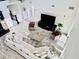 Aerial view of a spacious living room with a cozy sectional sofa at 7443 Lake Albert Dr, Windermere, FL 34786