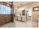 Modern bathroom featuring a glass shower, double vanity, and a stylish design at 17358 Hwy 27, Clermont, FL 34715