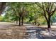Tree-lined driveway leading to a well-maintained property at 17358 Hwy 27, Clermont, FL 34715