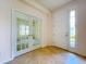 Inviting entryway with tile flooring and a view of an office through elegant French doors at 9582 Sw 70Th Loop, Ocala, FL 34481