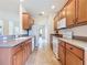 Well-lit kitchen with stainless steel appliances and ample counter space at 9582 Sw 70Th Loop, Ocala, FL 34481