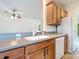 Kitchen view highlighting the cabinetry, sink, and modern appliances at 9582 Sw 70Th Loop, Ocala, FL 34481