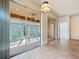 Bright sun room with sliding glass doors that let in plenty of natural light at 9582 Sw 70Th Loop, Ocala, FL 34481