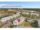 Aerial view showcases the condo near Disney Parks and Resorts, plus community pool and green spaces at 3120 Paradox Cir # 307, Kissimmee, FL 34746