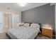 Bedroom features neutral tones, soft lighting, and comfortable furnishings at 3120 Paradox Cir # 307, Kissimmee, FL 34746