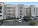 Apartment building exterior with assigned parking and parking for the physically disabled at 3120 Paradox Cir # 307, Kissimmee, FL 34746
