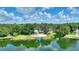 Scenic view of the property and the lake, highlighting its waterfront location at 3610 Pershing Ave, Orlando, FL 32812