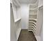 Bright walk-in closet with custom shelving and ample storage space for clothing and accessories at 3610 Pershing Ave, Orlando, FL 32812