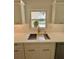 Modern kitchen sink with gold faucet and quartz countertops at 3610 Pershing Ave, Orlando, FL 32812