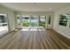 Living area with water view, hardwood floors and multiple windows for plenty of light at 3610 Pershing Ave, Orlando, FL 32812