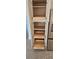 Pantry features custom wood drawers and shelving, offering practical storage solutions in the kitchen at 3610 Pershing Ave, Orlando, FL 32812