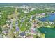 Aerial view of a lakefront home in a residential community at 5810 Lake Victoria Dr, Lakeland, FL 33813