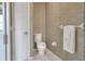 Clean bathroom with a toilet and a towel rack at 5810 Lake Victoria Dr, Lakeland, FL 33813