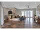 Spacious living room with hardwood floors, neutral walls, recessed lighting, and comfortable seating at 5810 Lake Victoria Dr, Lakeland, FL 33813