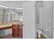 Bathroom features granite counters, wood cabinets, and a separate toilet room at 3657 Daydream Pl, St Cloud, FL 34772