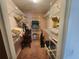 Spacious walk-in closet with ample shelving and storage options, perfect for organization at 738 Adidas Rd, Winter Springs, FL 32708