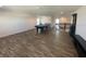 Open game room with a pool table and a dart board provides a large space for recreation and relaxation at 1142 Blarney St, Minneola, FL 34715