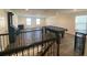 Game room with a pool table, game console and seating, accessible from the staircase at 1142 Blarney St, Minneola, FL 34715