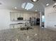 Modern kitchen featuring granite countertops, stainless steel appliances and ample cabinet space at 1142 Blarney St, Minneola, FL 34715