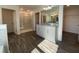 Main bathroom features a shower with glass doors and dual vanity with granite countertops at 1142 Blarney St, Minneola, FL 34715