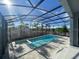 Enjoy a refreshing swim in this screened pool and patio area with serene outdoor living at 1142 Blarney St, Minneola, FL 34715