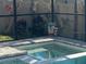 Hot tub next to a collection of tiki statues at 1142 Blarney St, Minneola, FL 34715