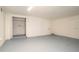 Spacious basement with painted floor and walls provides ample storage and utility space at 1501 7Th Se St, Winter Haven, FL 33880