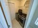 Laundry room with front loading washer and dryer at 1003 Clearpointe Way, Lakeland, FL 33813