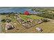 Sprawling property with lake access, featuring multiple buildings and expansive green space at 6820 County Road 561, Clermont, FL 34714