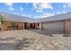 Ranch home showcasing brick accents, a two car garage, and a beautiful brick paved driveway at 6820 County Road 561, Clermont, FL 34714