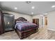 Another angle of the main bedroom that shows a large gun safe at 6820 County Road 561, Clermont, FL 34714
