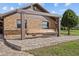 Covered porch featuring brick pavers, wood accents, a stained beam swing, and siding accents at 6820 County Road 561, Clermont, FL 34714