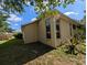 Angle of the property highlighting a garden on the side yard at 5352 Treasure View Way, Leesburg, FL 34748