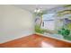 Bedroom with safari themed mural and wood floor at 1125 English Garden Ln, Winter Garden, FL 34787