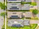 Drone's perspective of a neighborhood displaying orderly rows of houses and community planning at 11865 Ginsberg Pl, Orlando, FL 32832