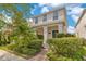 Charming two-story home with well-maintained landscaping and inviting curb appeal at 11865 Ginsberg Pl, Orlando, FL 32832