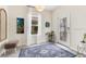 Bright foyer with a stylish rug, decorative artwork, and ample natural light at 11865 Ginsberg Pl, Orlando, FL 32832