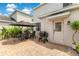 Outdoor patio with grill, seating and door to the house at 11865 Ginsberg Pl, Orlando, FL 32832